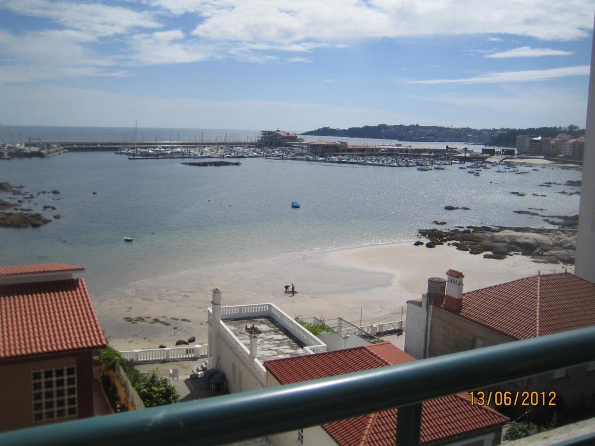 Appartamento Precioso ático con vistas a pie de playa Sanxenxo Esterno foto