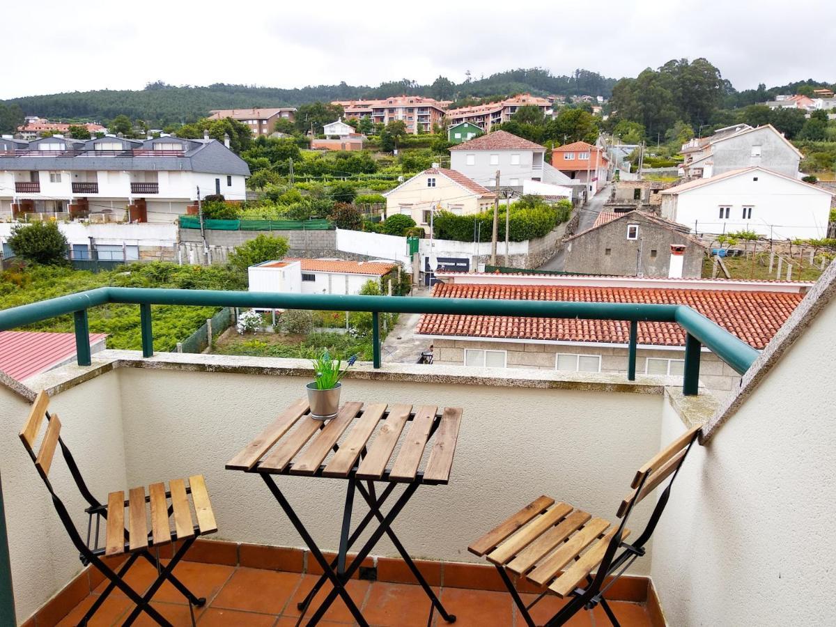 Appartamento Precioso ático con vistas a pie de playa Sanxenxo Esterno foto